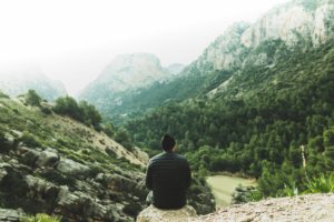 Man looking over dramatic landscape